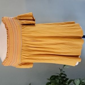 Harlow and Rose Off shoulder mustard top flutter sleeve colorful stitching